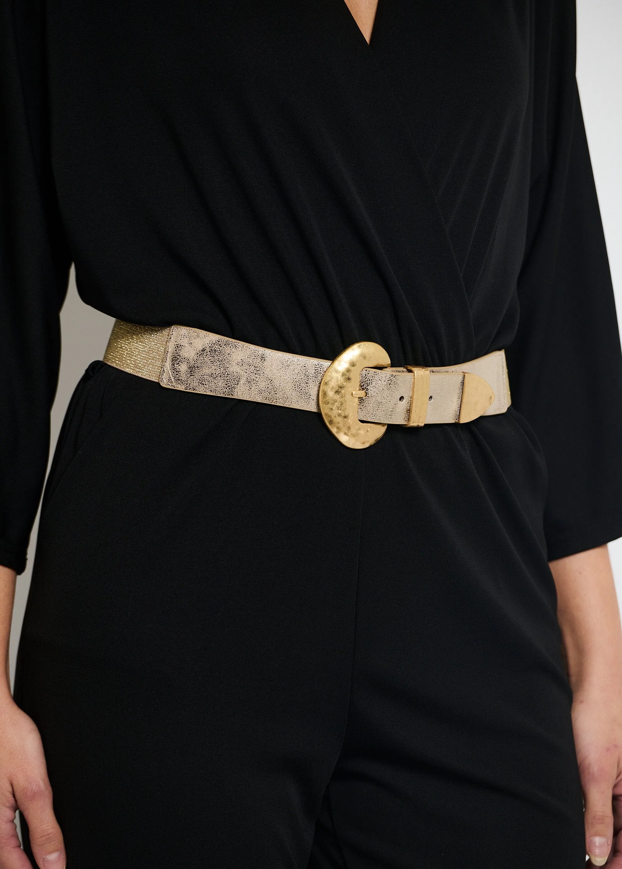 Elastic belt with metal buckle