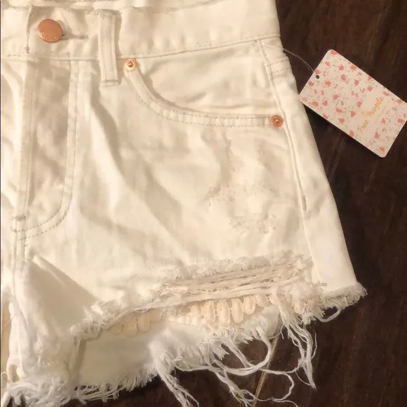 Free People ivory denim shorts