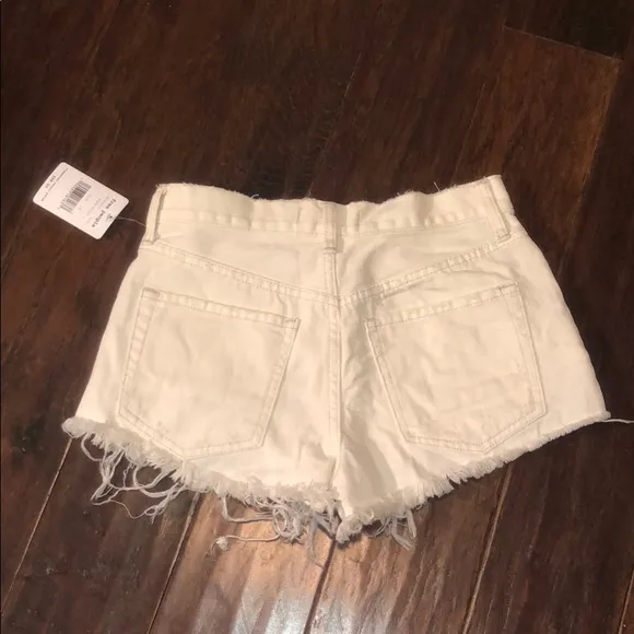 Free People ivory denim shorts