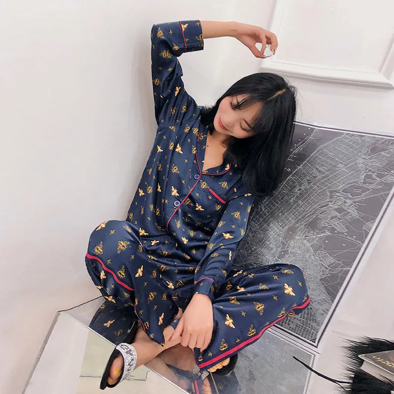 male female long sleeved trousers and silk pajamas