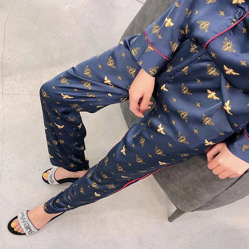male female long sleeved trousers and silk pajamas